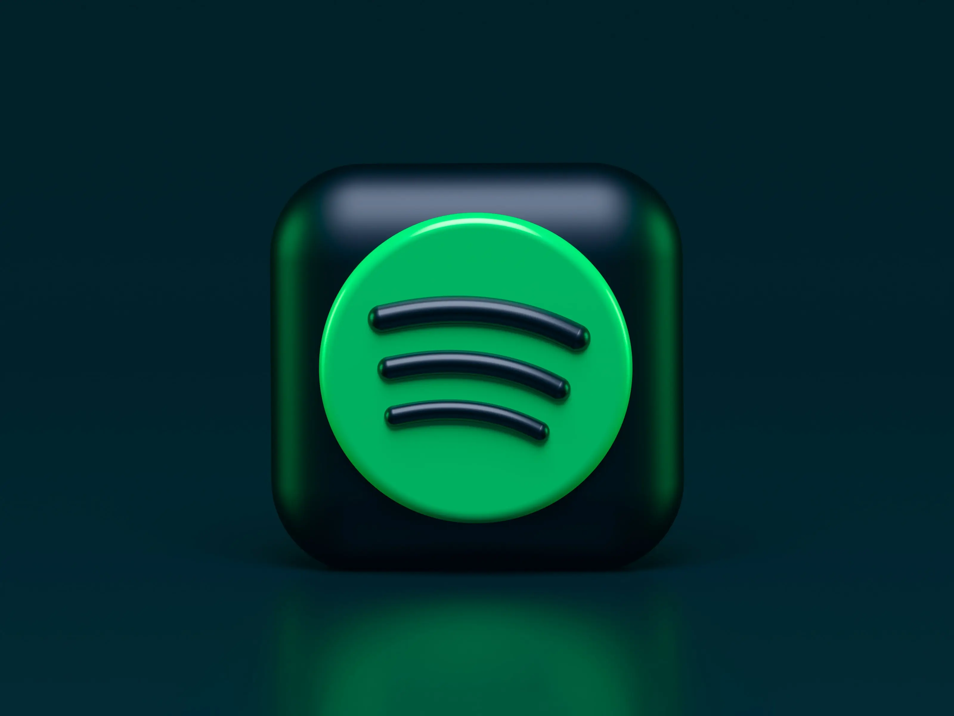 a pair of earbuds with the spotify icon